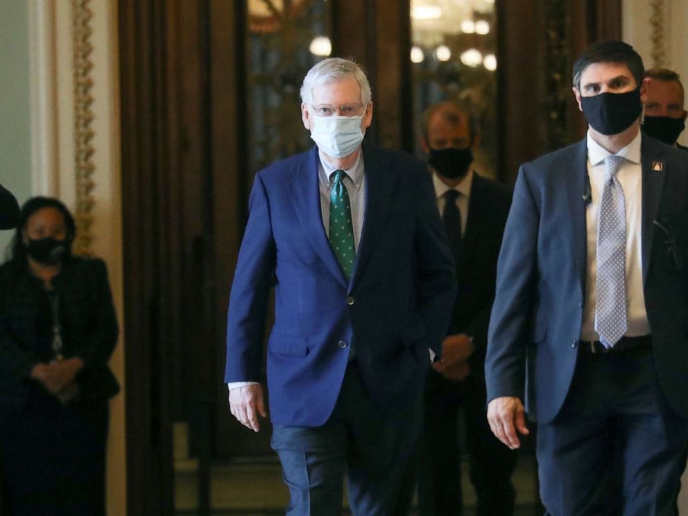 PHOTO: Senate Majority Leader Mitch McConnell walks inside the U.S. Capitol as senators returned to Capitol Hill in Washington, May 4, 2020.