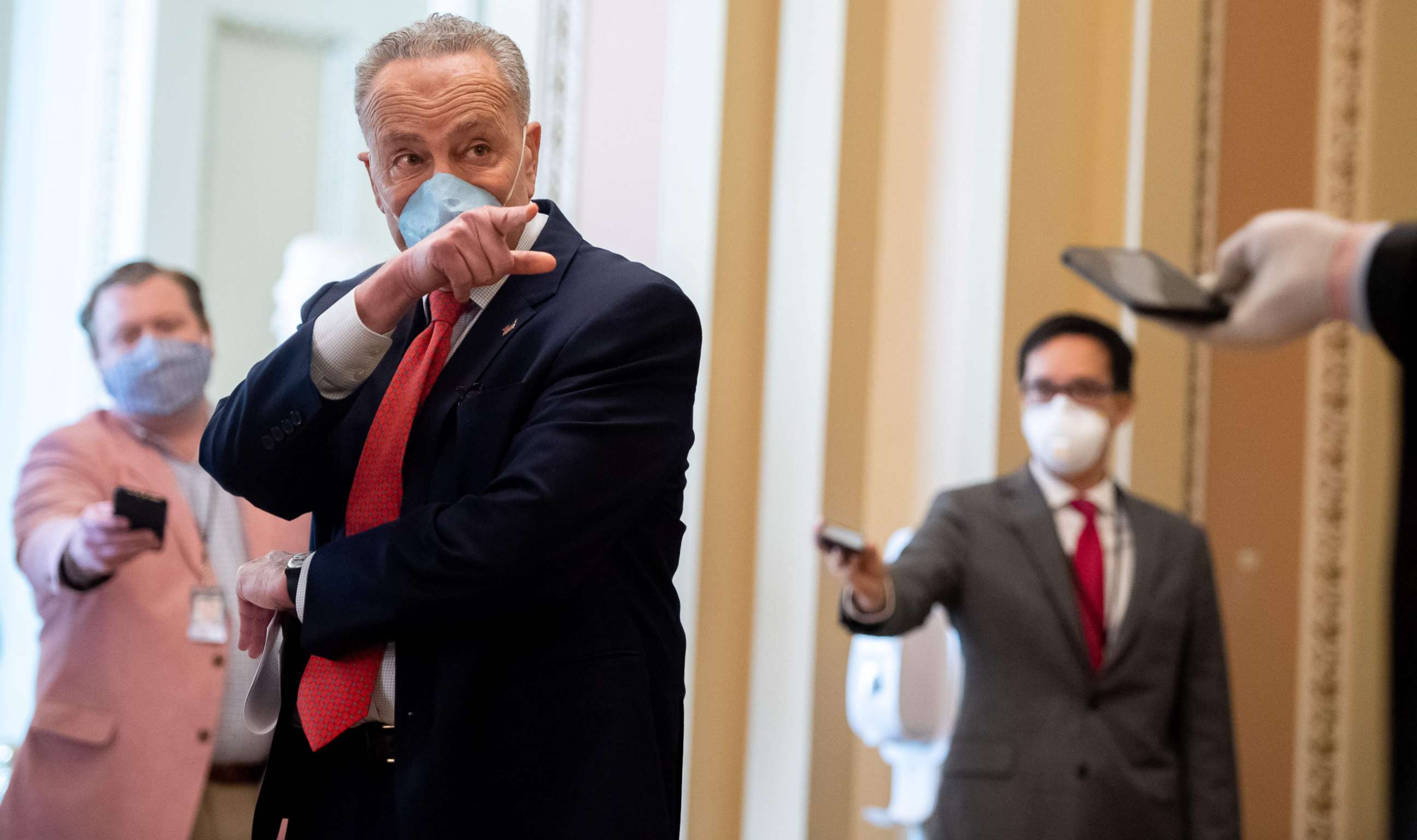 PHOTO: Senate Minority Leader Chuck Schumer wears a mask to protect himself and others from COVID-19 as he speaks to the press as the Senate returns into session at the U.S. Capitol in Washington, May 4, 2020.