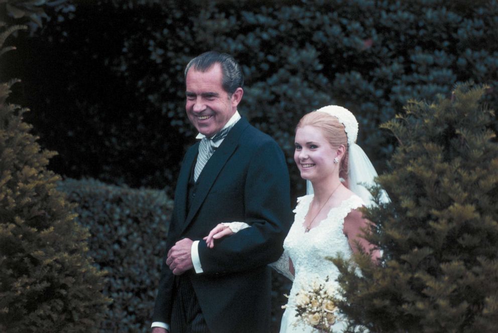 PHOTO: President Richard Nixon escorts his daughter Tricia from the White House to the rose garden for her marriage to Edward Finch Cox, June 12, 1971.