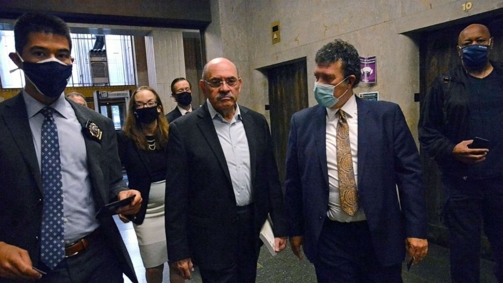 PHOTO: Allen Weisselberg, second from left, Donald Trump's long-serving chief financial officer, surrenders on July 1, 2021, at the lower Manhattan building that houses the criminal courts and the district attorney's office. 