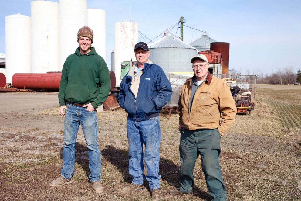 PHOTO: Third generation farmer Donald Wendland Jr. in  Saginaw, Michigan photographed with his father and son.