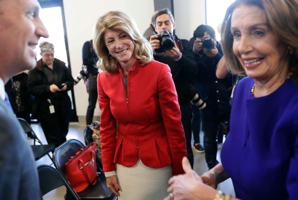 PHOTO: Former state senator Wendy Davis, center, visits with Speaker of the House Nancy Pelosi, right, following a stop for a news conference, March 5, 2019, in Austin, Texas.
