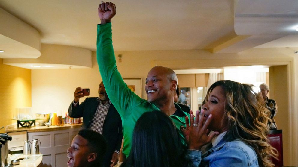 PHOTO: Democrat Wes Moore, his wife Dawn and their children react after Moore was declared the winner of the Maryland governor's race on Nov. 8, 2022 in Baltimore.