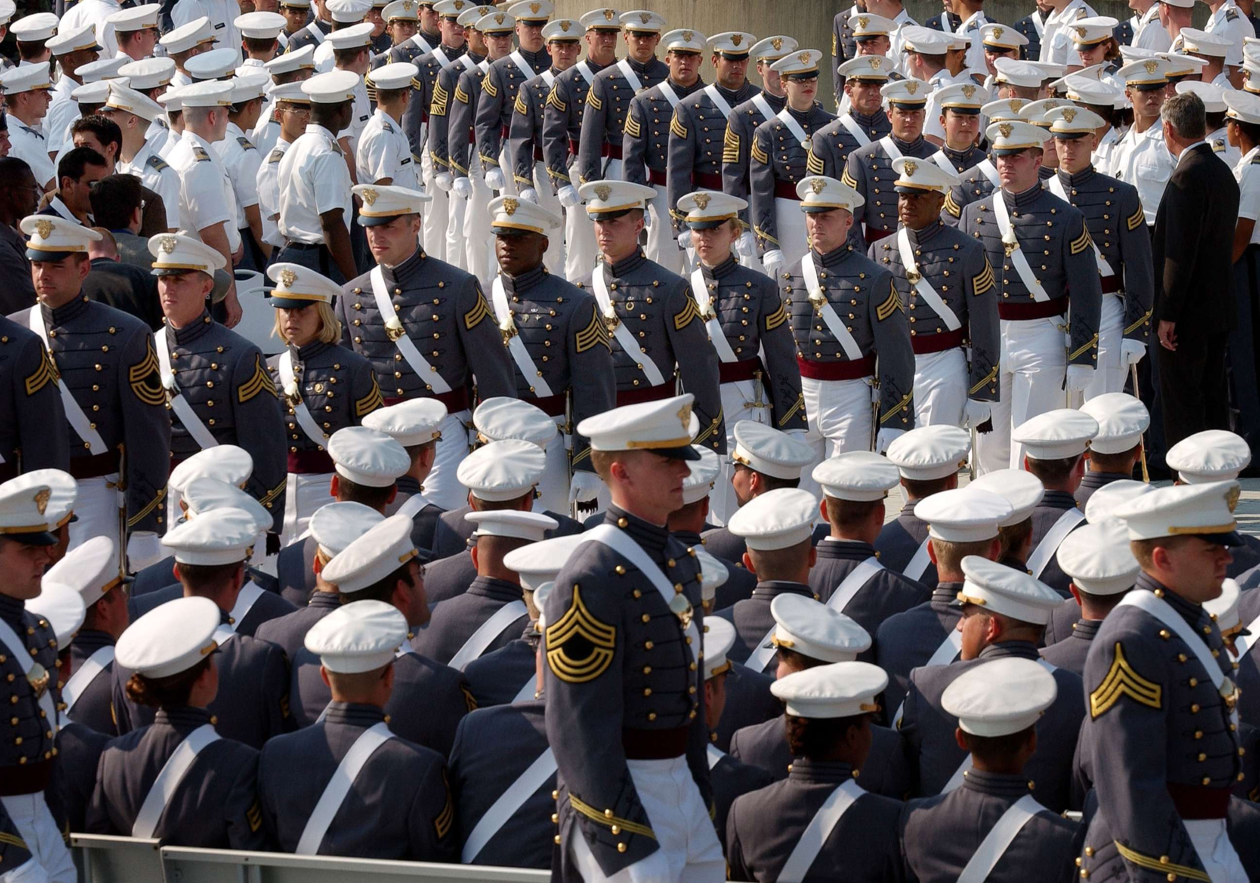 PHOTO: U.S. Military Academy cadets line up before receiving their diplomas and commissions into the officer corp of the U.S. Army June 1, 2002 at West Point in New York.