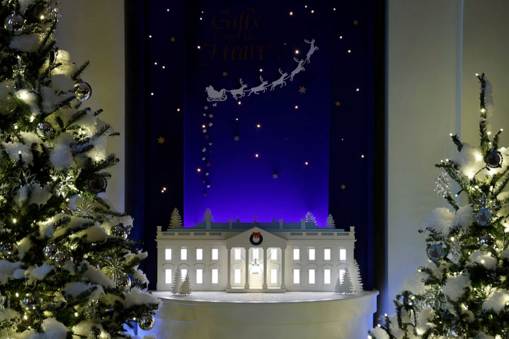 PHOTO: A replica White House decorates the Booksellers Hall during a press tour of White House Christmas decorations in Washington, Nov. 29, 2021.