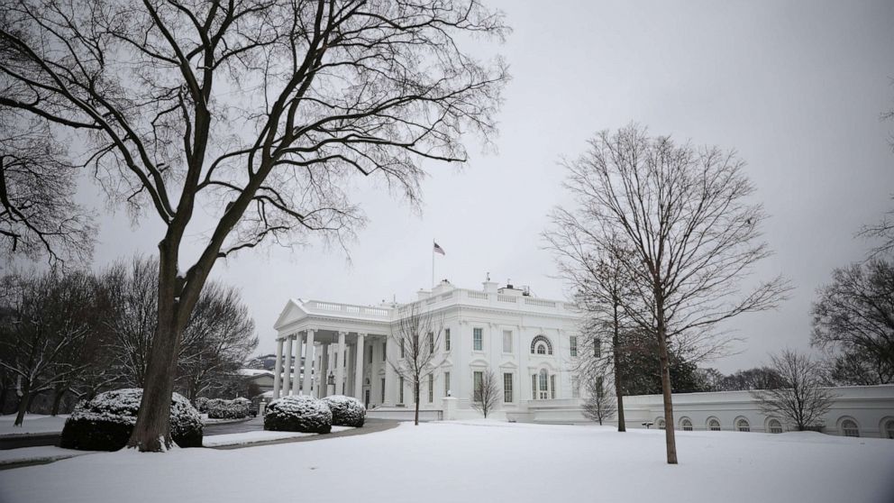 PHOTO: Snow from a previous day storm is seen blanketed across the White House North Lawn in Washington, D.C., Feb. 1, 2021.