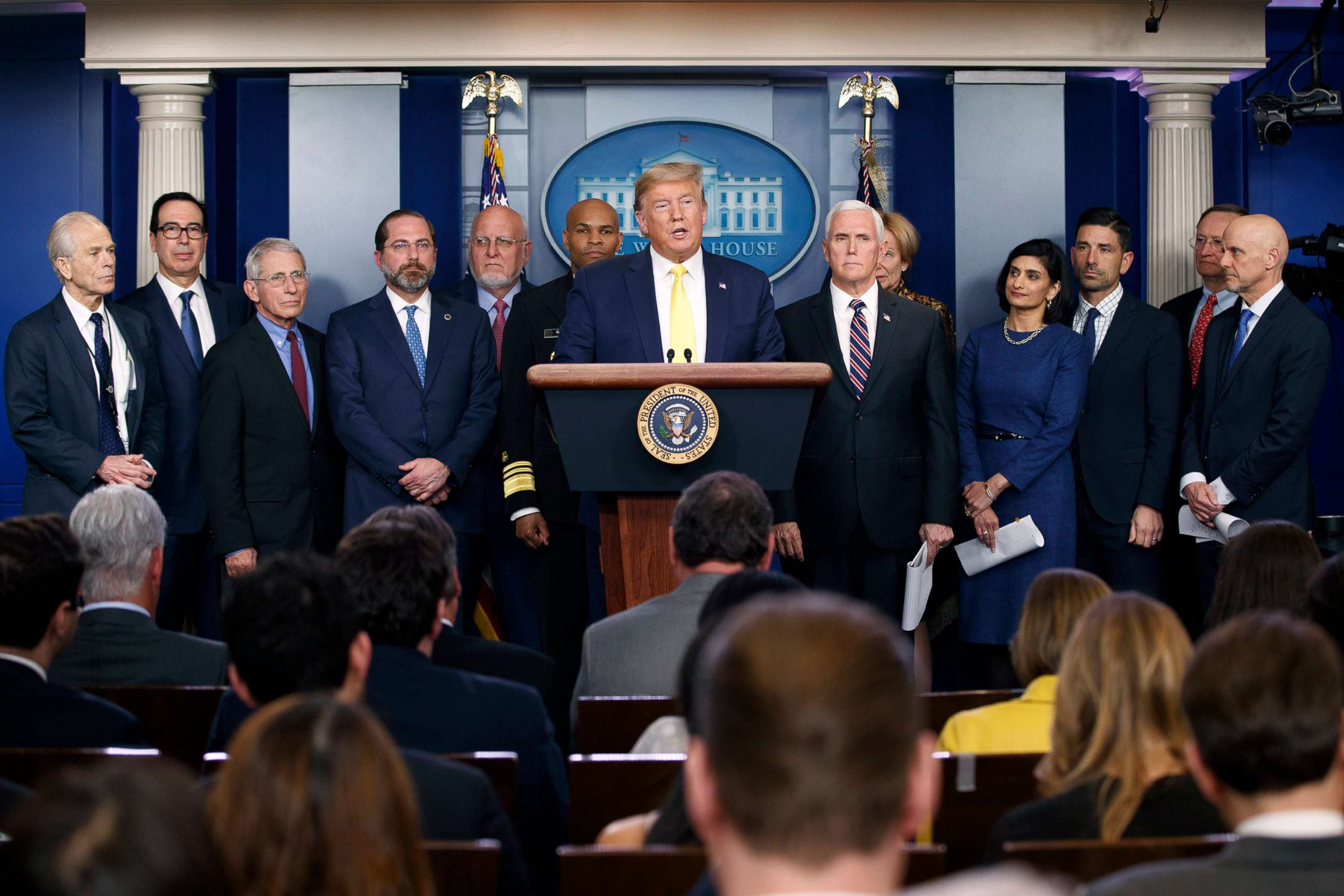 PHOTO: President Donald Trump speaks surrounded by members of the White House Coronavirus Task Force in the briefing room at the White House in Washington, March, 9, 2020.