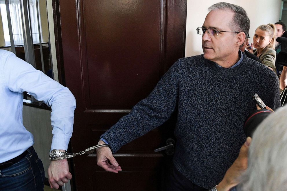 PHOTO: In this Aug. 23, 2019, file photo, Paul Whelan, a former U.S. Marine accused of spying and arrested in Russia, arrives in handcuffs to attend his hearing at a court in Moscow.