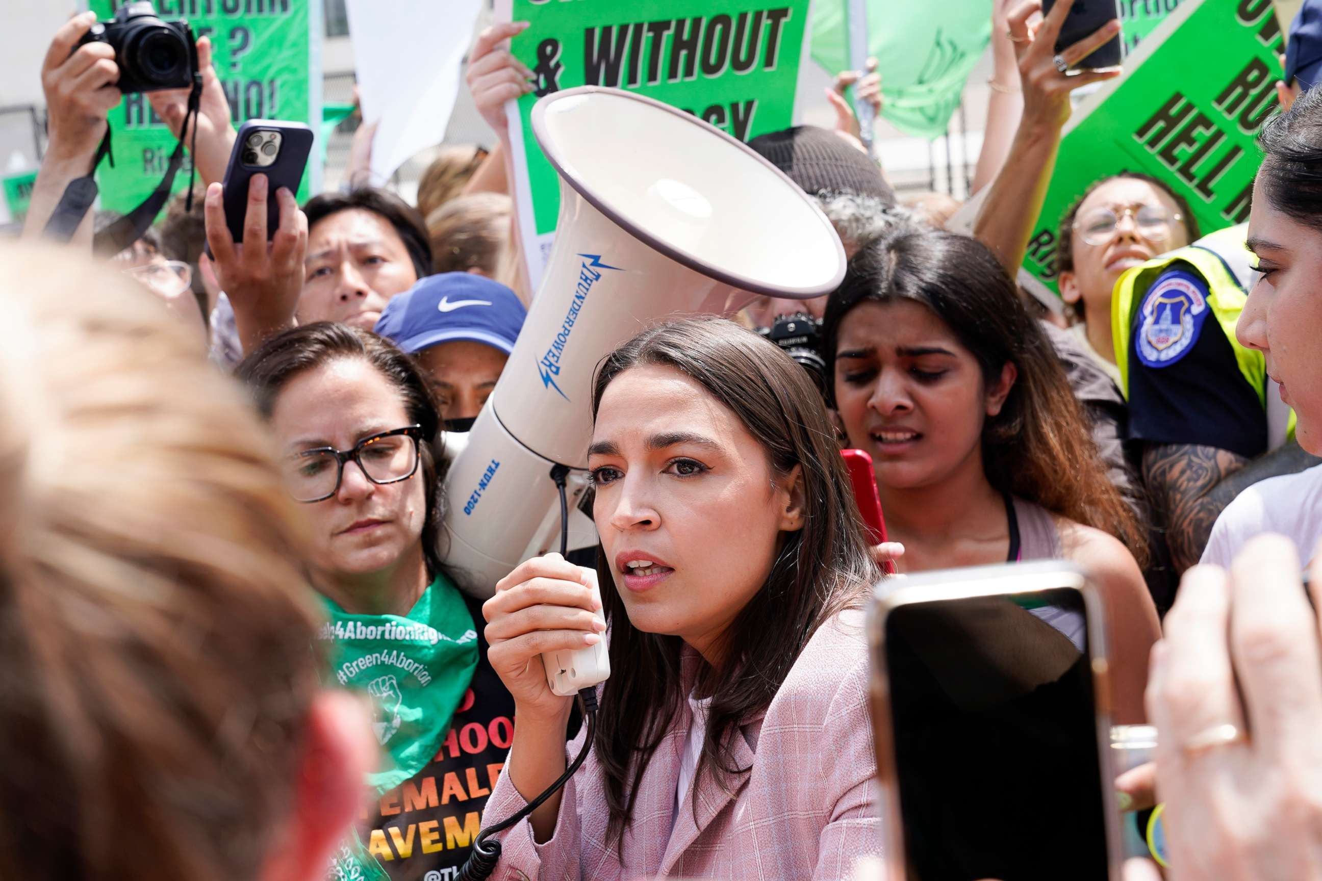 PHOTO: Rep. Alexandria Ocasio-Cortez joins abortion-rights activists as they demonstrate following Supreme Court's decision to overturn Roe v. Wade in Washington, June 24, 2022. 