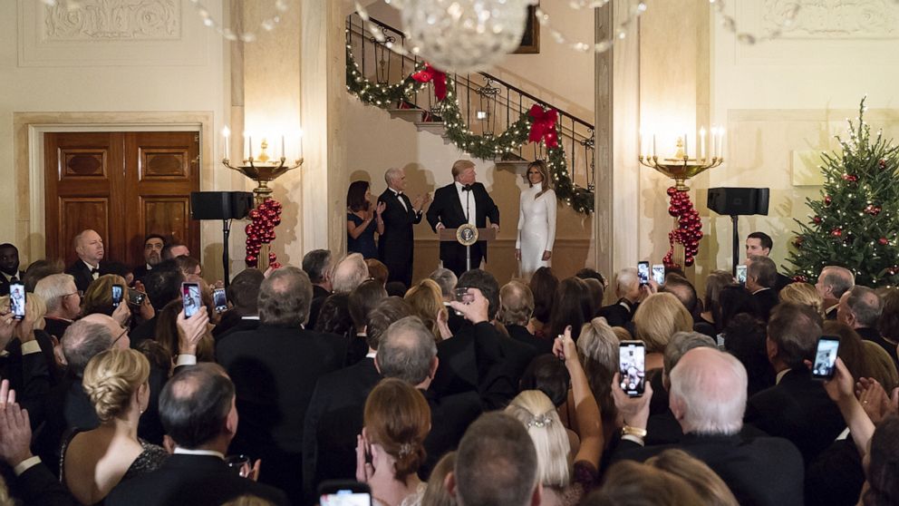 PHOTO: President Donald Trump, joined by First Lady Melania Trump, Vice President Mike Pence and Karen Pence, delivers remarks in the Grand Foyer of the White House, Dec. 15, 2018, in Washington, DC.