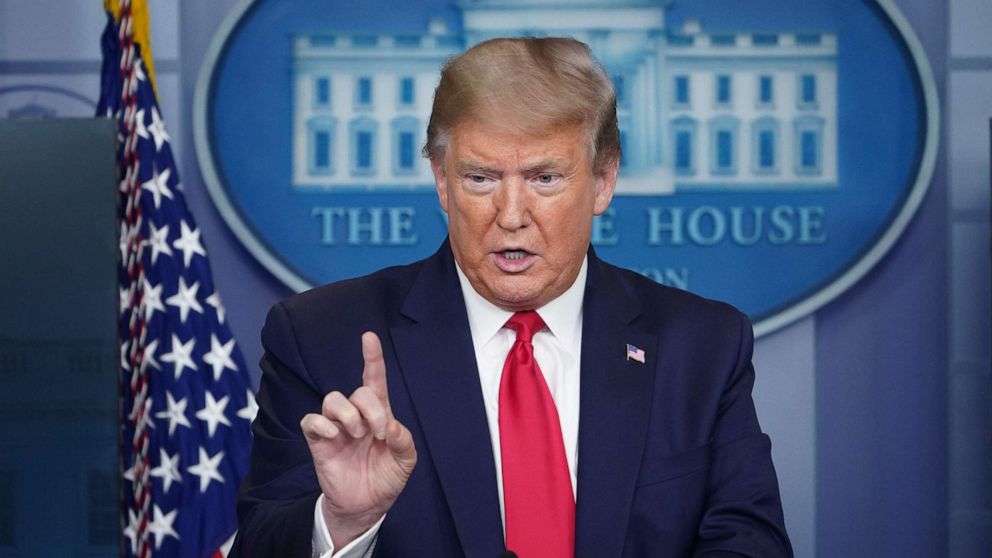 PHOTO: President Donald Trump gestures while he speaks during the daily briefing on the novel coronavirus, at the White House on April 13, 2020, in Washington.