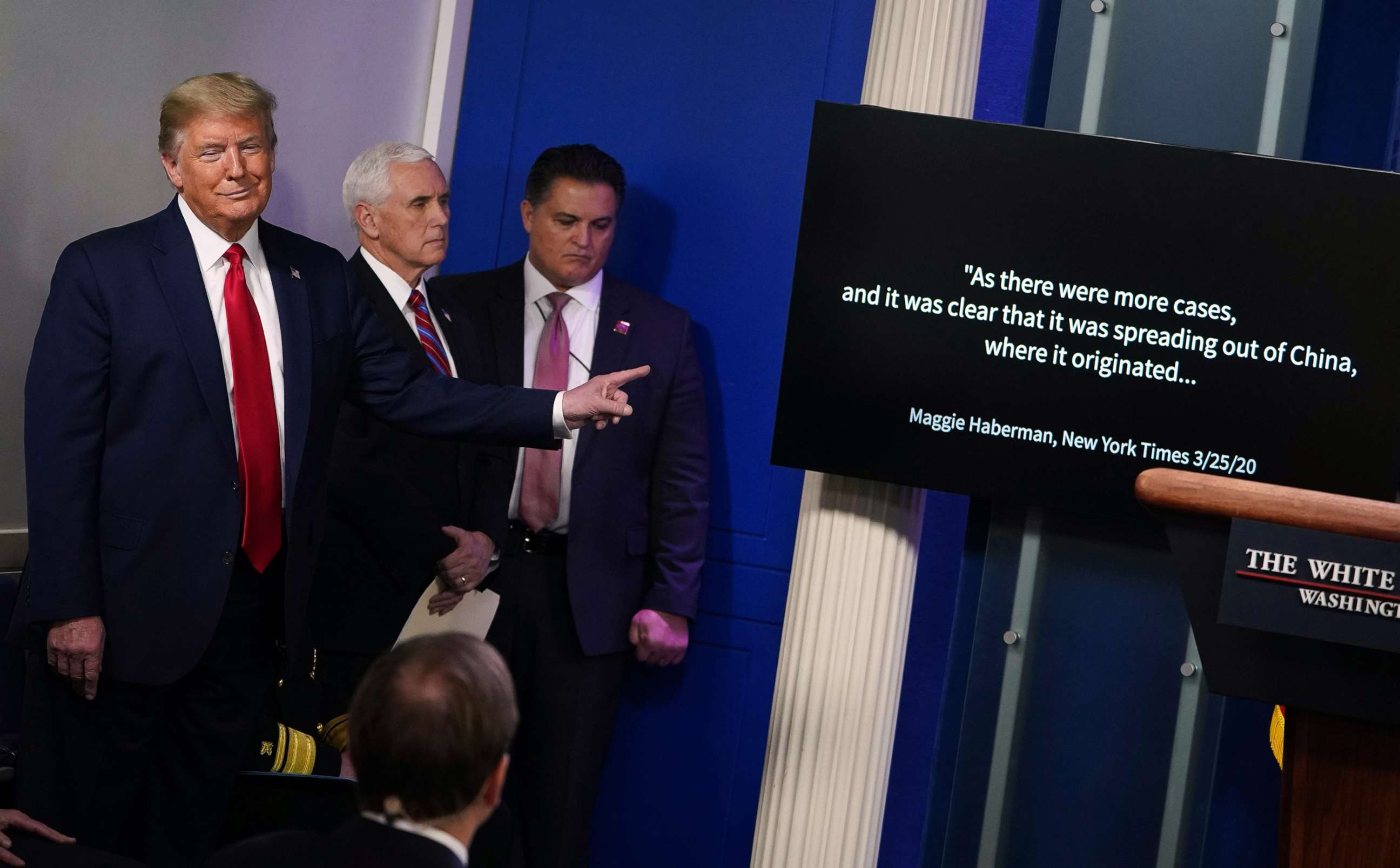 PHOTO: President Donald Trump gestures toward a video monitor during the daily briefing on the novel coronavirus at the White House on April 13, 2020, in Washington.