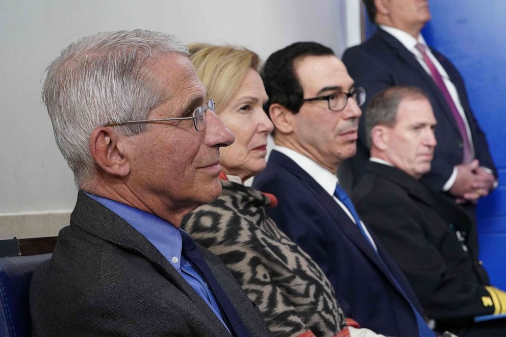 PHOTO: Anthony Fauci, Deborah Birx, Secretary of the Treasury Steve Mnuchin and Rear Adm. John Polowczyk listen during the daily briefing on the novel coronavirus, April 13, 2020, in Washington.