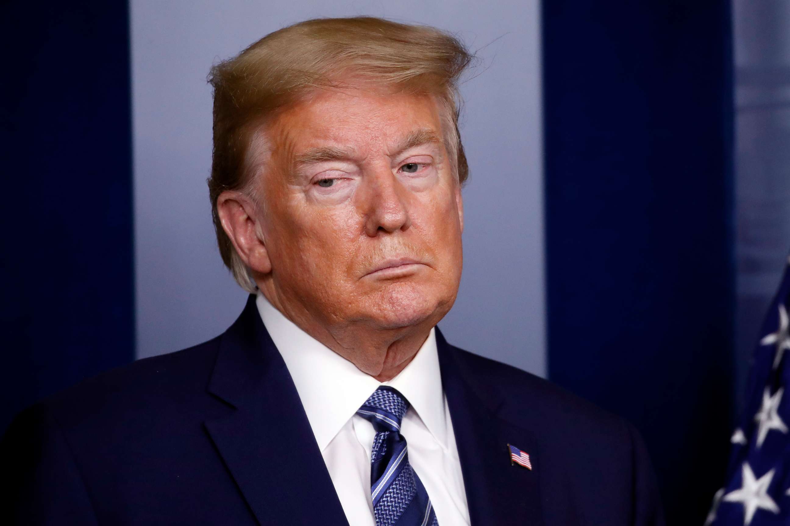 PHOTO: President Donald Trump listens as Dr. Deborah Birx speaks about the coronavirus in the James Brady Press Briefing Room of the White House, April 21, 2020, in Washington.