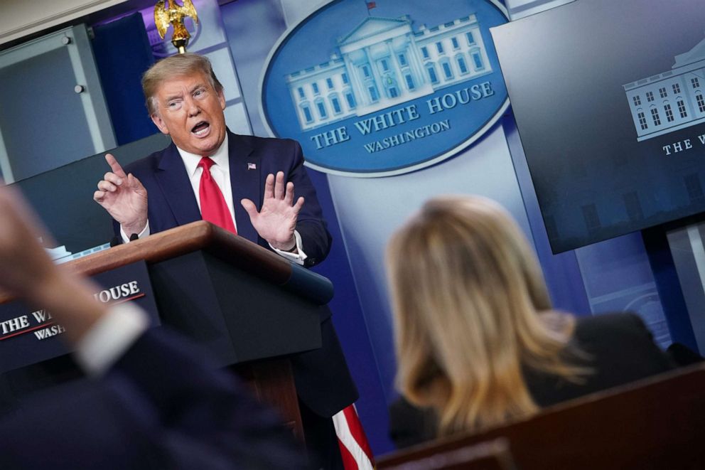 PHOTO: President Donald Trump answers questions from the press during the daily briefing on the novel coronavirus at the White House on April 13, 2020, in Washington.