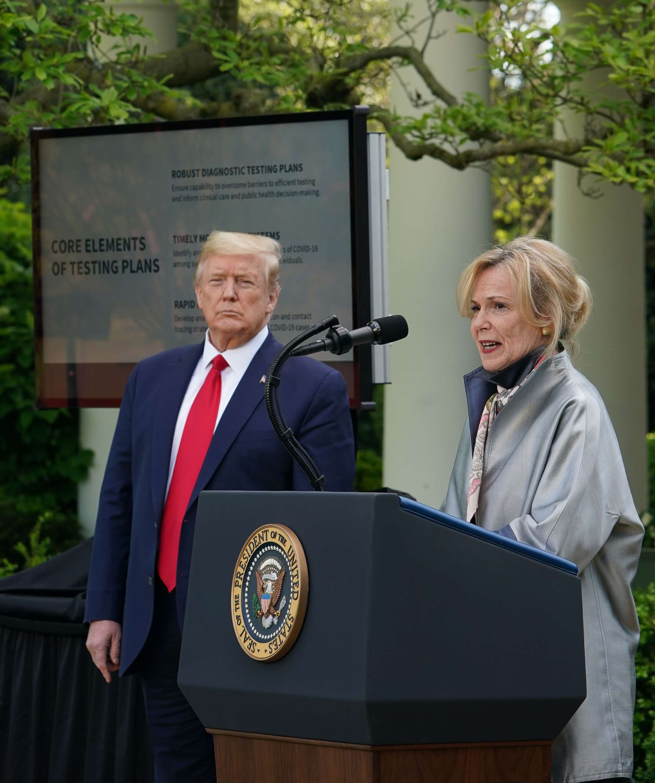 PHOTO: Response coordinator for White House Coronavirus Task Force Deborah Birx speaks as President Donald Trump listens during  a news conference on the novel coronavirus in the Rose Garden of the White House in Washington, April 27, 2020.