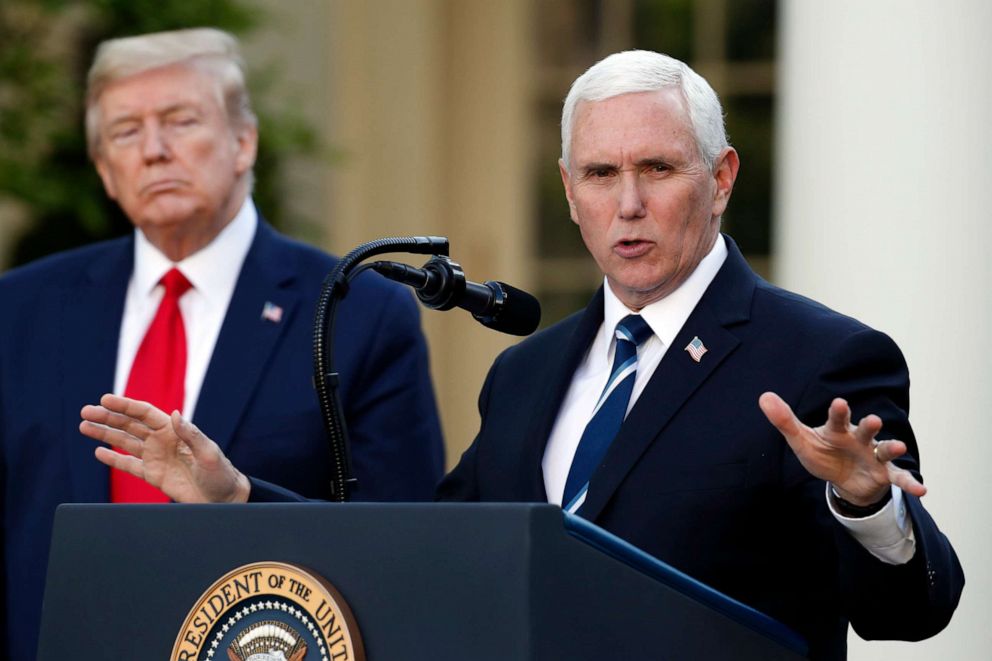PHOTO: President Donald Trump listens as Vice President Mike Pence speaks about the coronavirus in the Rose Garden of the White House, April 27, 2020, in Washington.