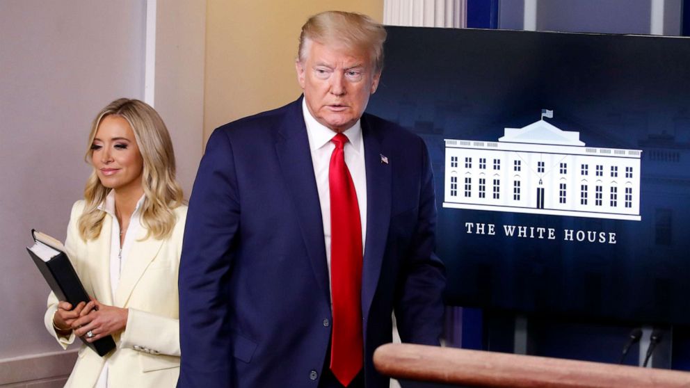 PHOTO: President Donald Trump arrives with White House press secretary Kayleigh McEnany to speak with reporters about the coronavirus in the James Brady Briefing Room of the White House, May 22, 2020, in Washington.