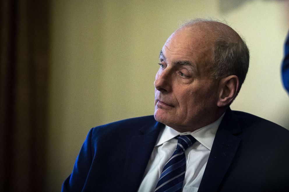 PHOTO: John Kelly, White House Chief of Staff, listens to President Donald Trump, without a photo, speaking at the White House in Washington, DC, April 9, 2018