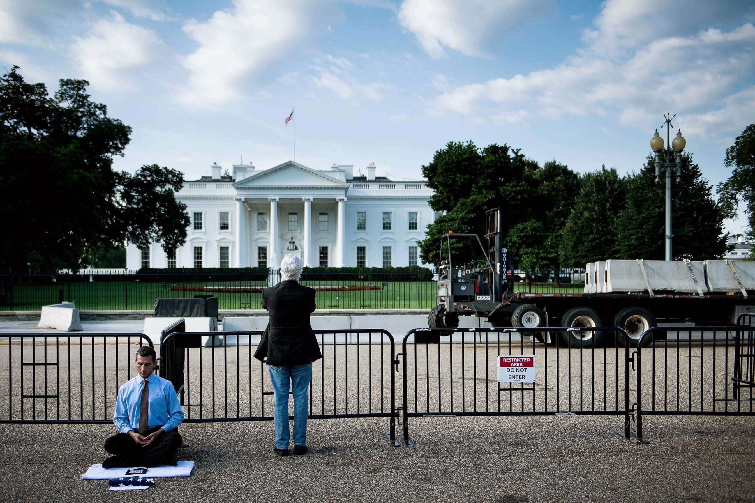 PHOTO: Preparations are made to modify the fence surrounding the White House, July 12, 2019, in Washington, D.C.