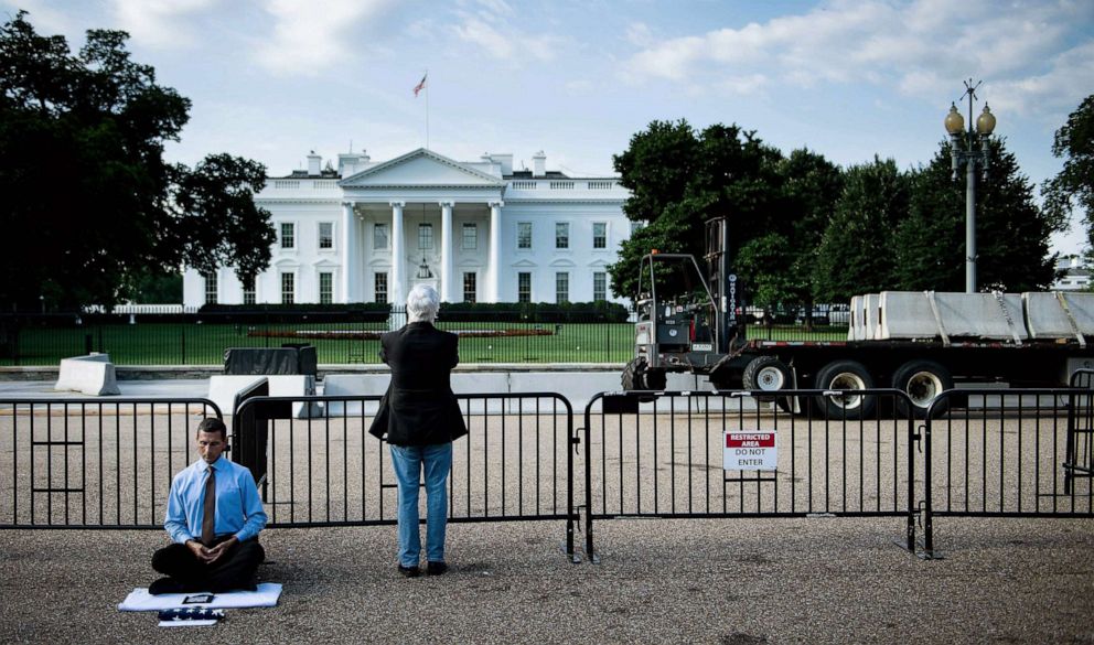 Construction fences going up around White House for a long planned