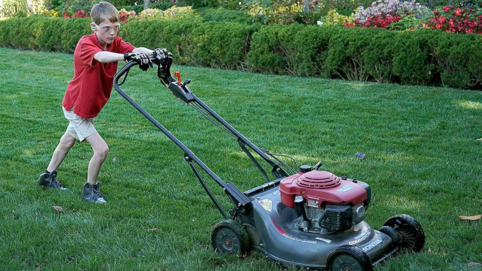PHOTO: Frank "FX" Giaccio, 11, mows the grass in the Rose Garden of the White House, Sept. 15, 2017, in Washington.