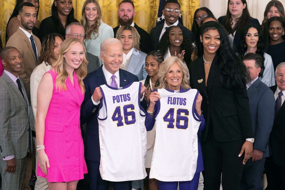 PHOTO: President Joe Biden and First Lady Jill Biden get jerseys from the champion Louisiana State University Women's Basketball Team at the White House in Washington, DC, on May 26, 2023.
