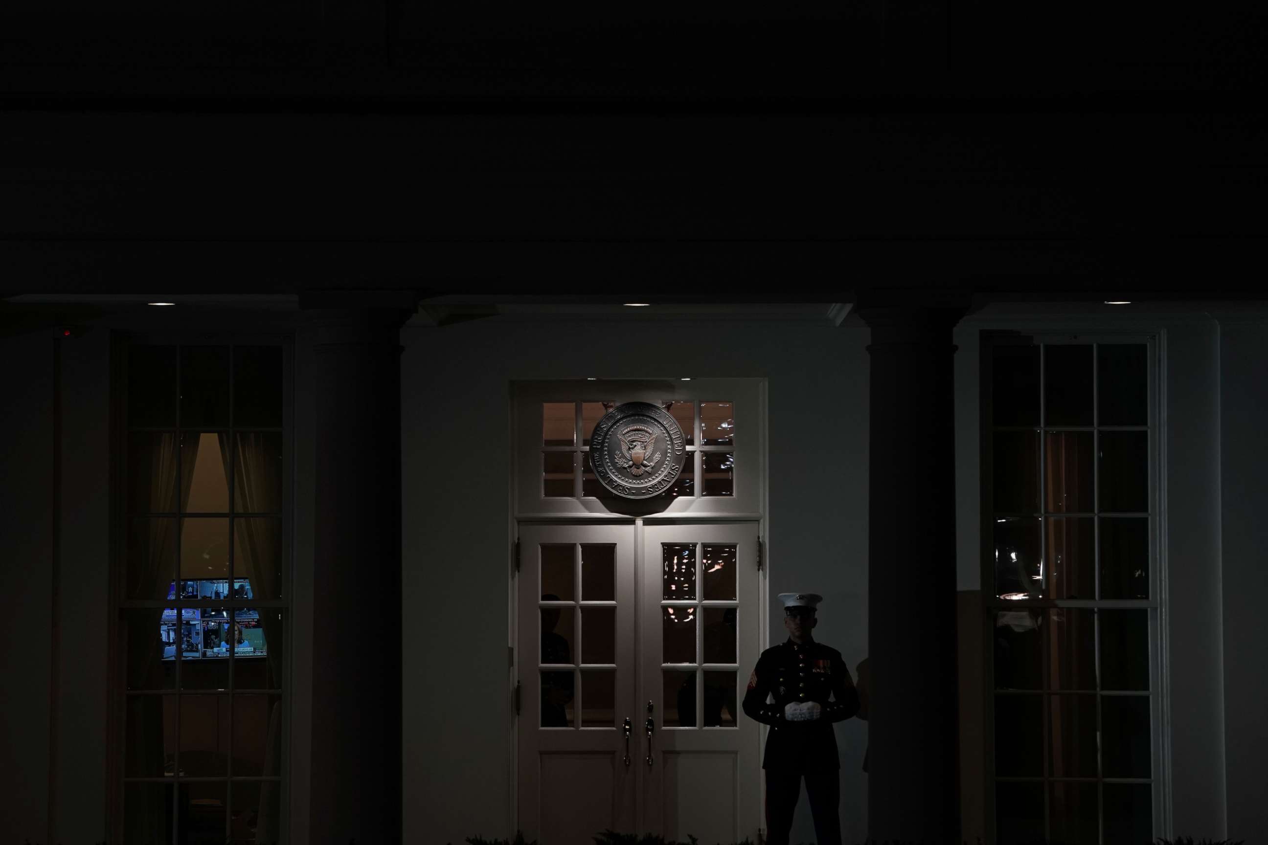 PHOTO: A U.S. Marine guards the West Wing entrance of the White House, Jan. 8, 2019 in Washington, D.C. 