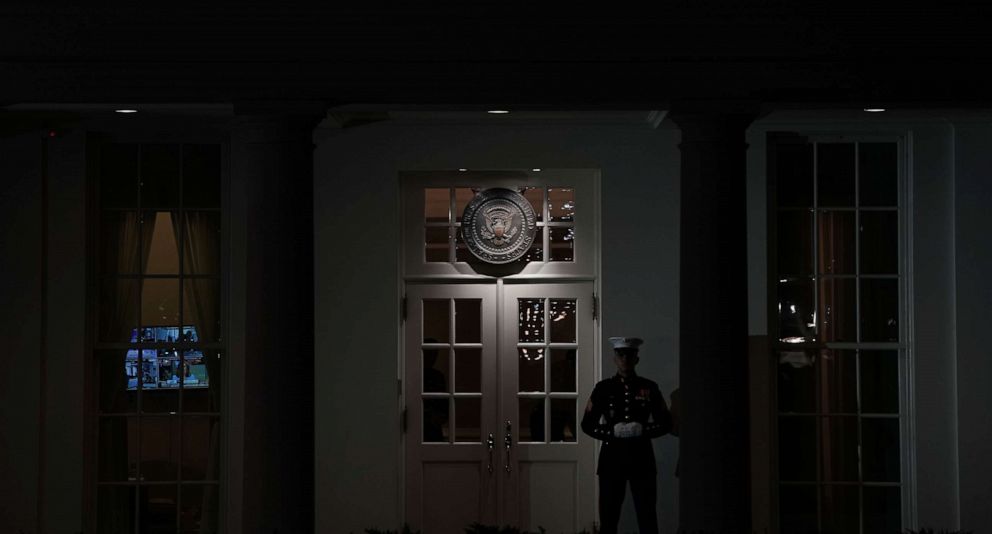 PHOTO: A U.S. Marine guards the West Wing entrance of the White House, Jan. 8, 2019 in Washington, D.C. 