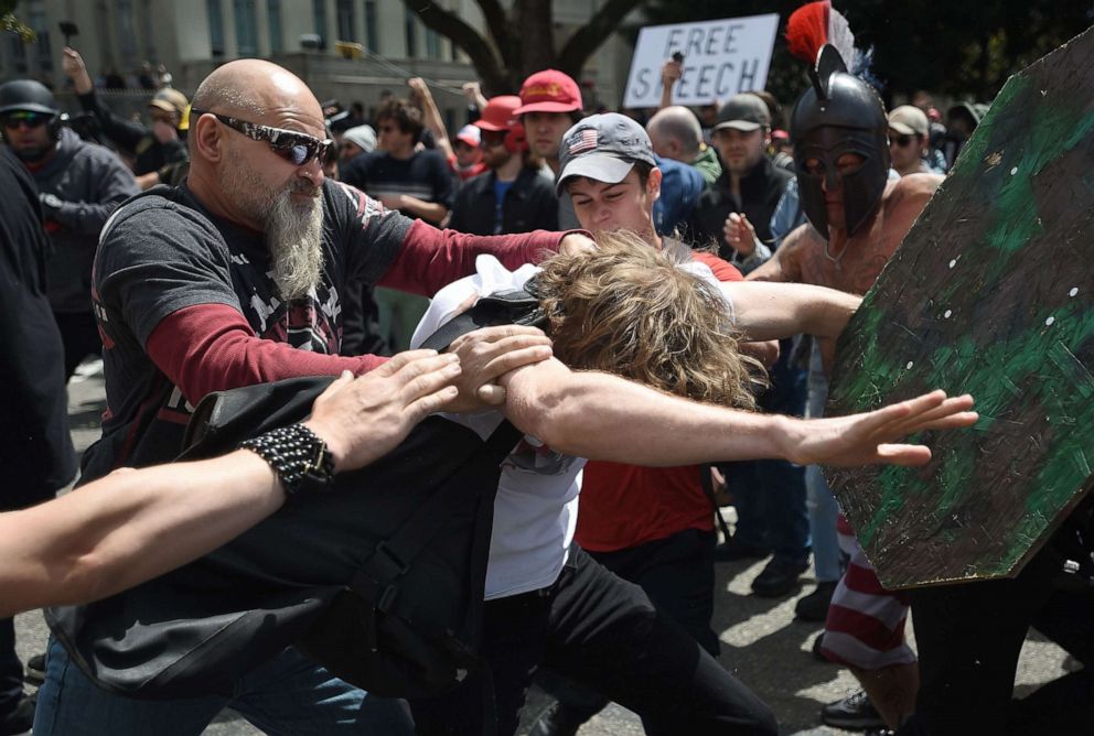 PHOTO: A man gets hit as fights break out between Trump supporters and anti-Trump protesters in Berkeley, Calif., on April 15, 2017.
