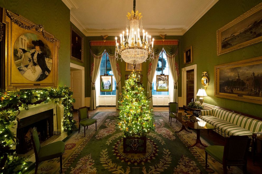 PHOTO: A Christmas tree and decorations are on display in the Green Room of the White House on Nov. 30, 2020.