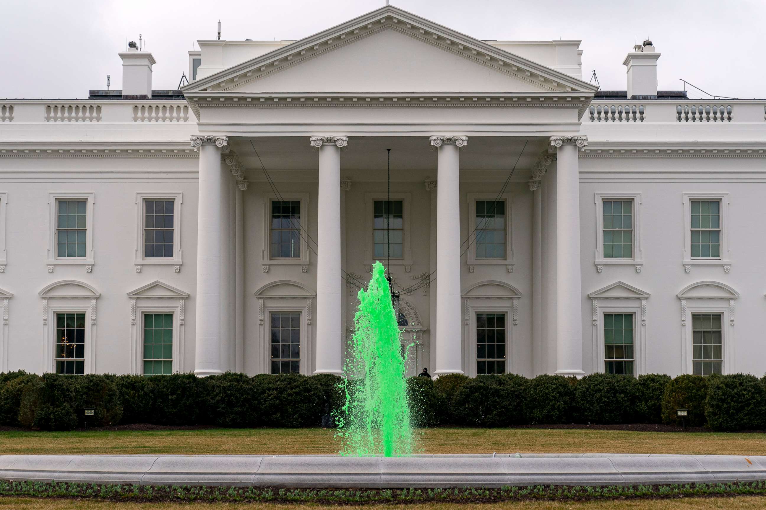 PHOTO: The fountain on the North Lawn of the White House is dyed green for St. Patrick's Day, March 17, 2021.