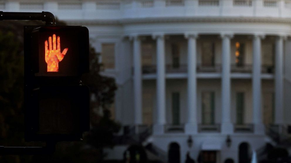 PHOTO: A traffic sign is seen near the White House Oct. 5, 2020, as President Donald Trump continues hospitalized at Walter Reed National Military Medical Center after tested positive for the coronavirus disease (COVID-19) in Washington.