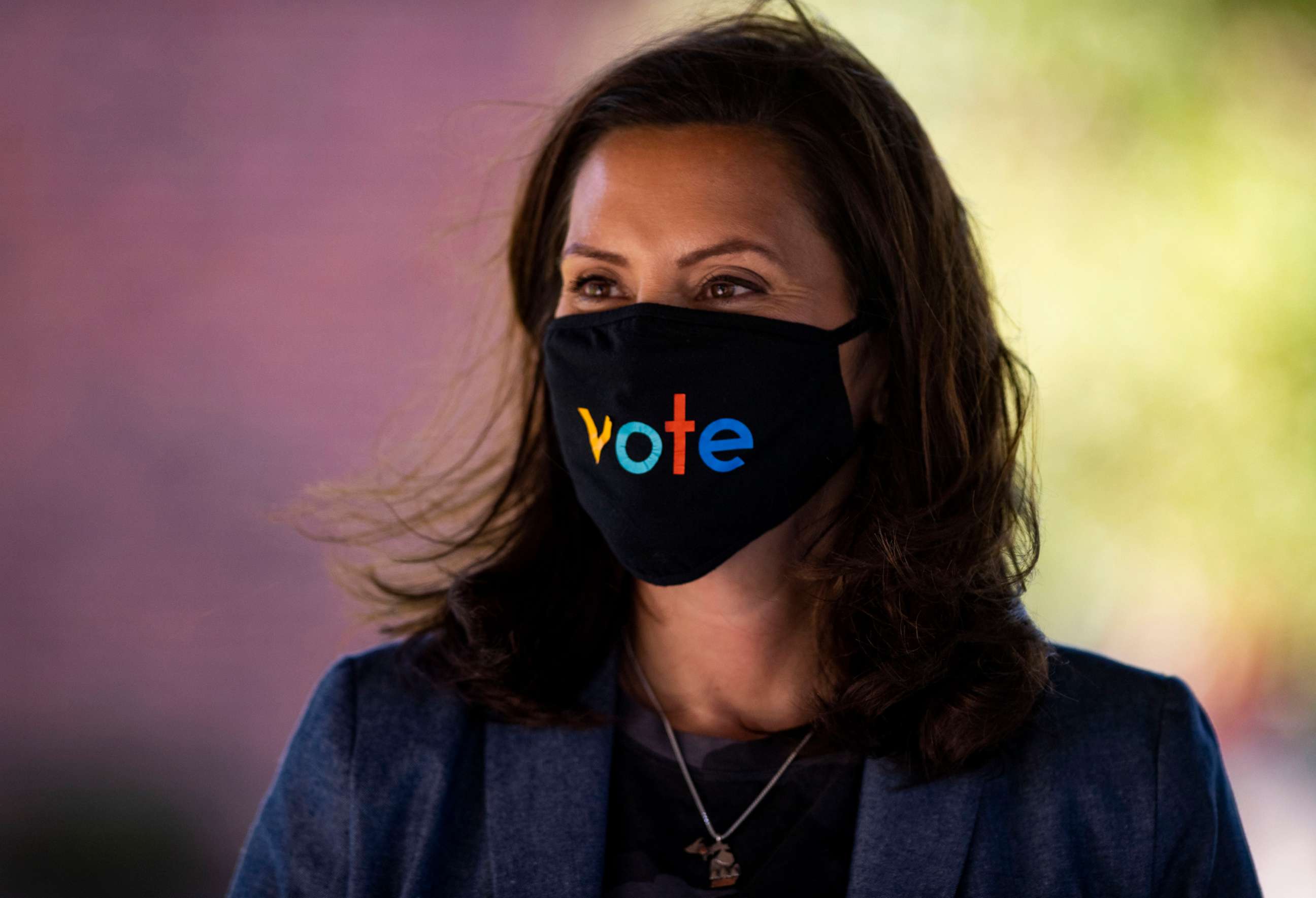 PHOTO: Michigan Gov. Gretchen Whitmer wears a mask with the word "vote" displayed on the front during a roundtable discussion on healthcare, Oct. 7, 2020, in Kalamazoo, Mich.