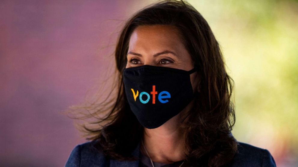 PHOTO: Michigan Gov. Gretchen Whitmer wears a mask with the word "vote" displayed on the front during a roundtable discussion on healthcare, Oct. 7, 2020, in Kalamazoo, Mich.