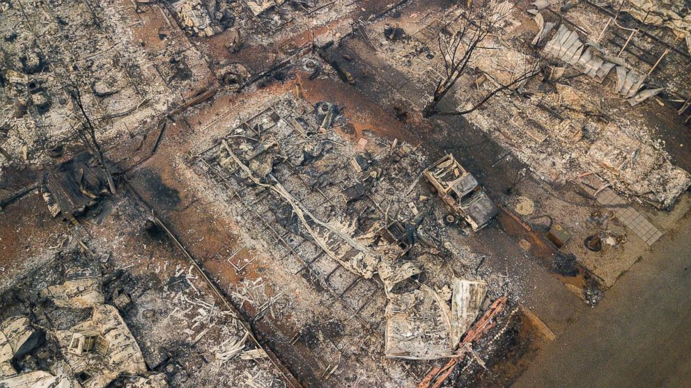 PHOTO: Debris and residences leveled by the wildfire line a neighborhood in Paradise, Calif., Nov. 15, 2018. 