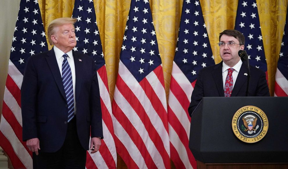 PHOTO: President Donald Trump listens as Secretary of Veterans Affairs Robert Wilkie speaks on protecting Americas seniors from the COVID-19 pandemic in the East Room of the White House, April 30, 2020. 
