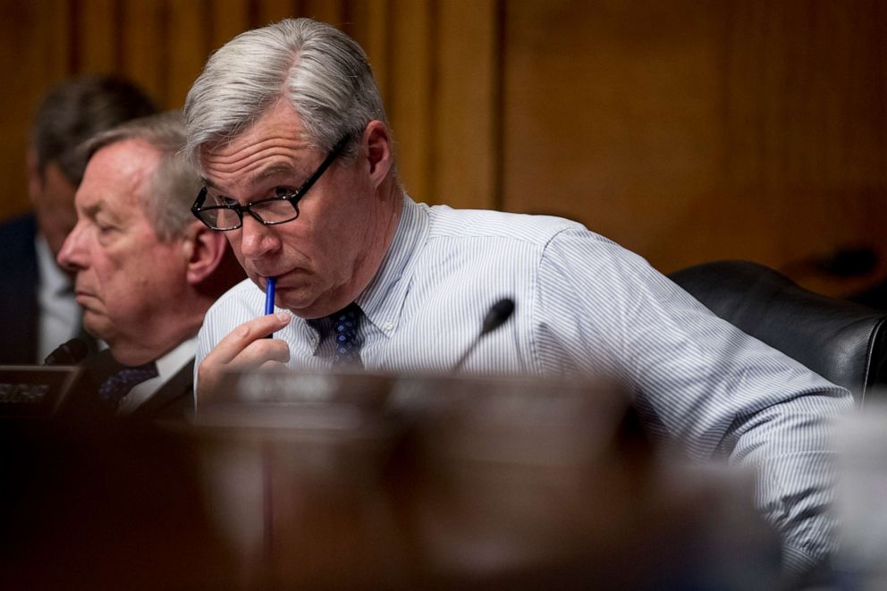 PHOTO: Sen. Sheldon Whitehouse listens as Attorney General William Barr testifies during a Senate Judiciary Committee hearing on Capitol Hill in Washington, May 1, 2019.