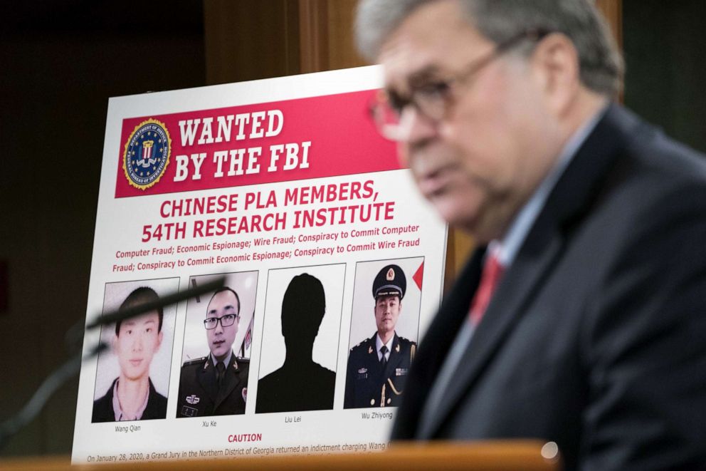 PHOTO: Attorney General William Barr participates in a press conference at the Department of Justice along with DOJ officials, Feb. 10, 2020 in Washington, DC.