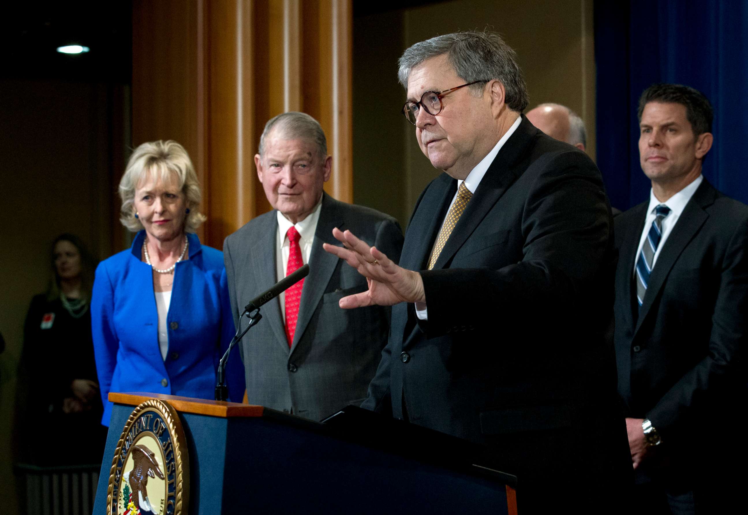 PHOTO: Former director of the FBI and CIA, William Webster, accompanied by his wife Lynda Webster, watches as Attorney General William Barr speaks during a news conference in Washington, March 7, 2019.