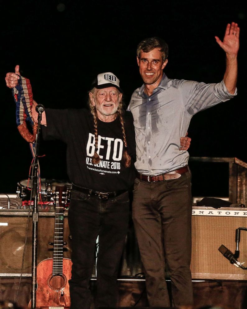 PHOTO: Beto O'Rourke, right, along with country music legend Willie Nelson, left, wave to supporters at a Turn Out For Texas Rally in Austin, Texas, Sept. 29, 2018.