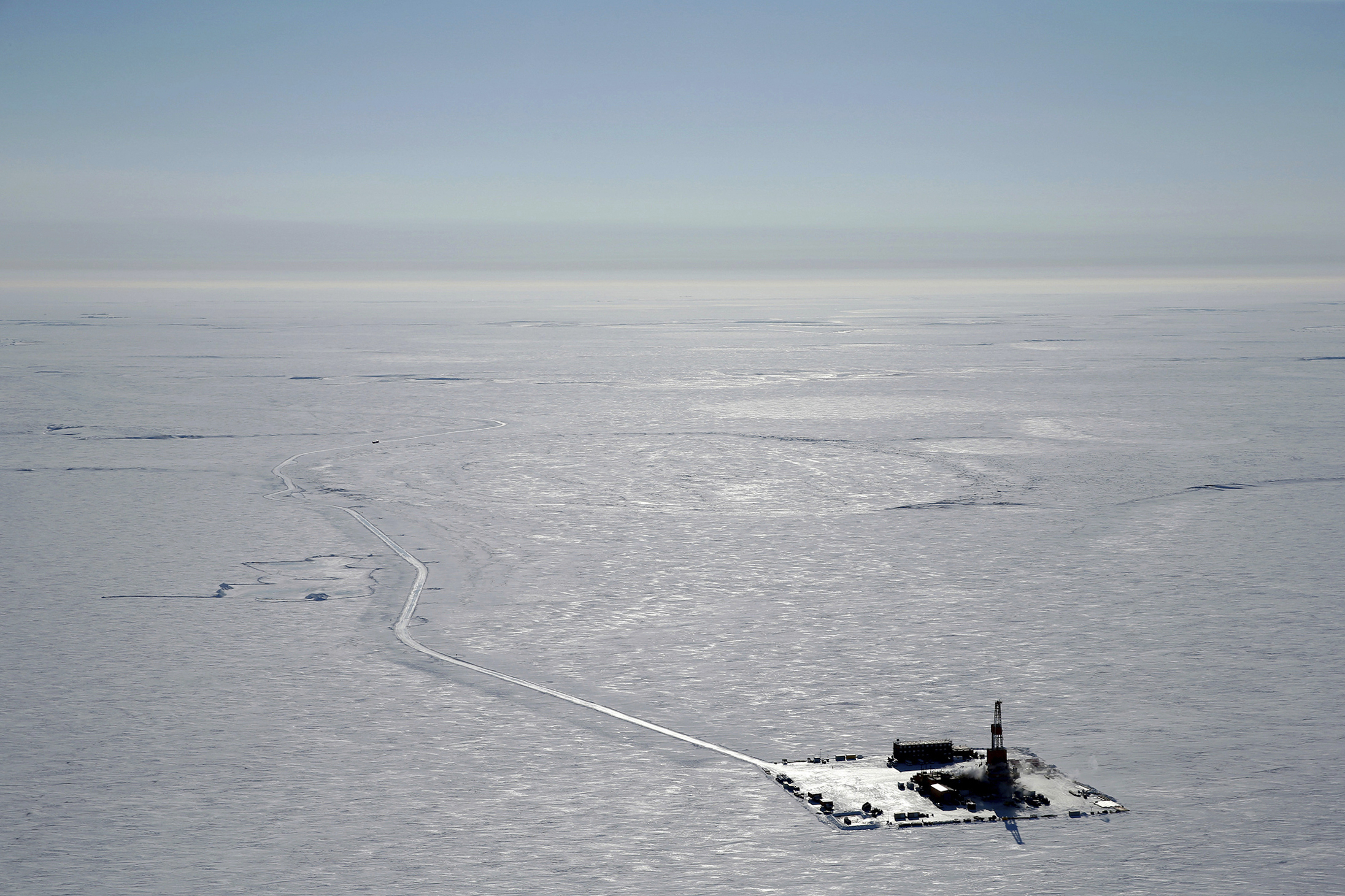 PHOTO: FILE - This 2019 aerial photo provided by ConocoPhillips shows an exploratory drilling camp at the proposed site of the Willow oil project on Alaska's North Slope. T