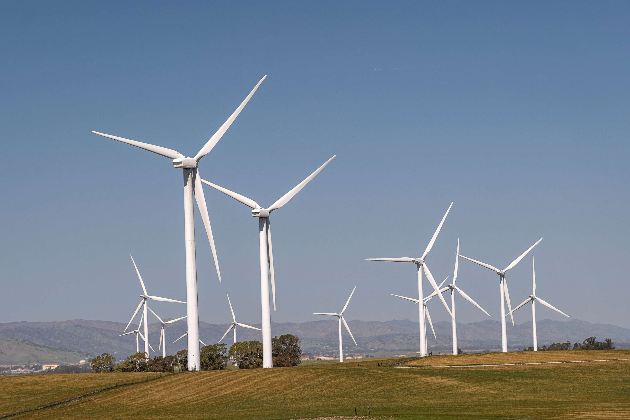 PHOTO: Wind turbines operate at a wind farm near Highway 12 in Rio Vista, Calif., March 30, 2021.