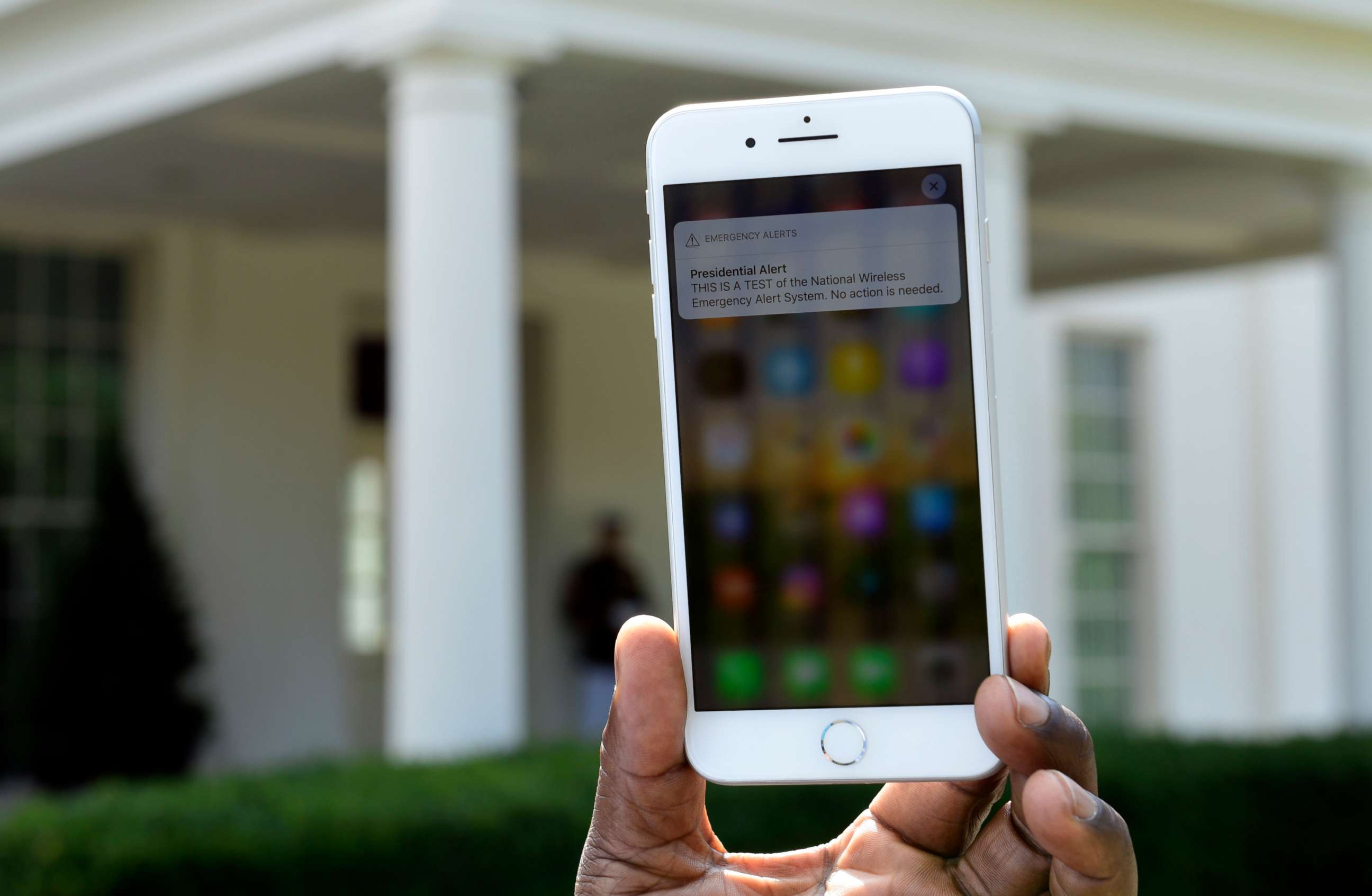 PHOTO: The first test of the national wireless emergency system by the Federal Emergency Management Agency is shown on a cellular phone at the White House in Washington, Oct. 3, 2018.