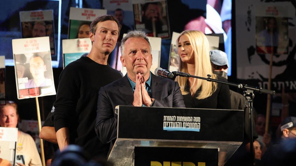 PHOTO: U.S. Middle East envoy Steve Witkoff (C) speaks as businessman Jared Kushner and his wife Ivanka Trump look on, during a gathering at "Hostages' Square" in Tel Aviv, on Oct. 11, 2025. 