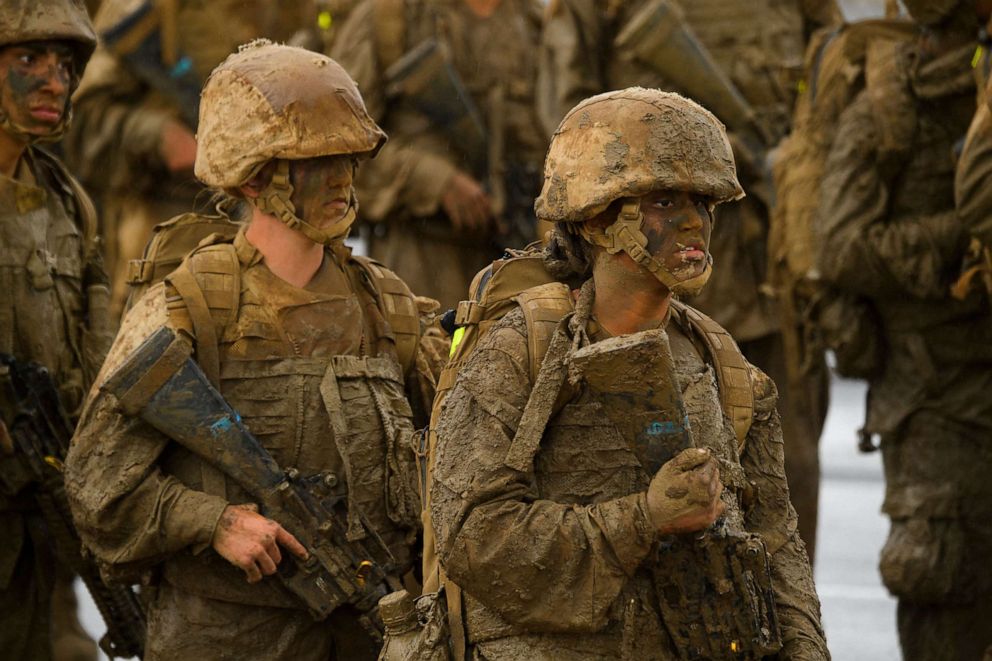 PHOTO: United States Marine Corps (USMC) recruits from Lima Company, the first gender integrated training class in San Diego, march, April 21, 2021, at Camp Pendleton.