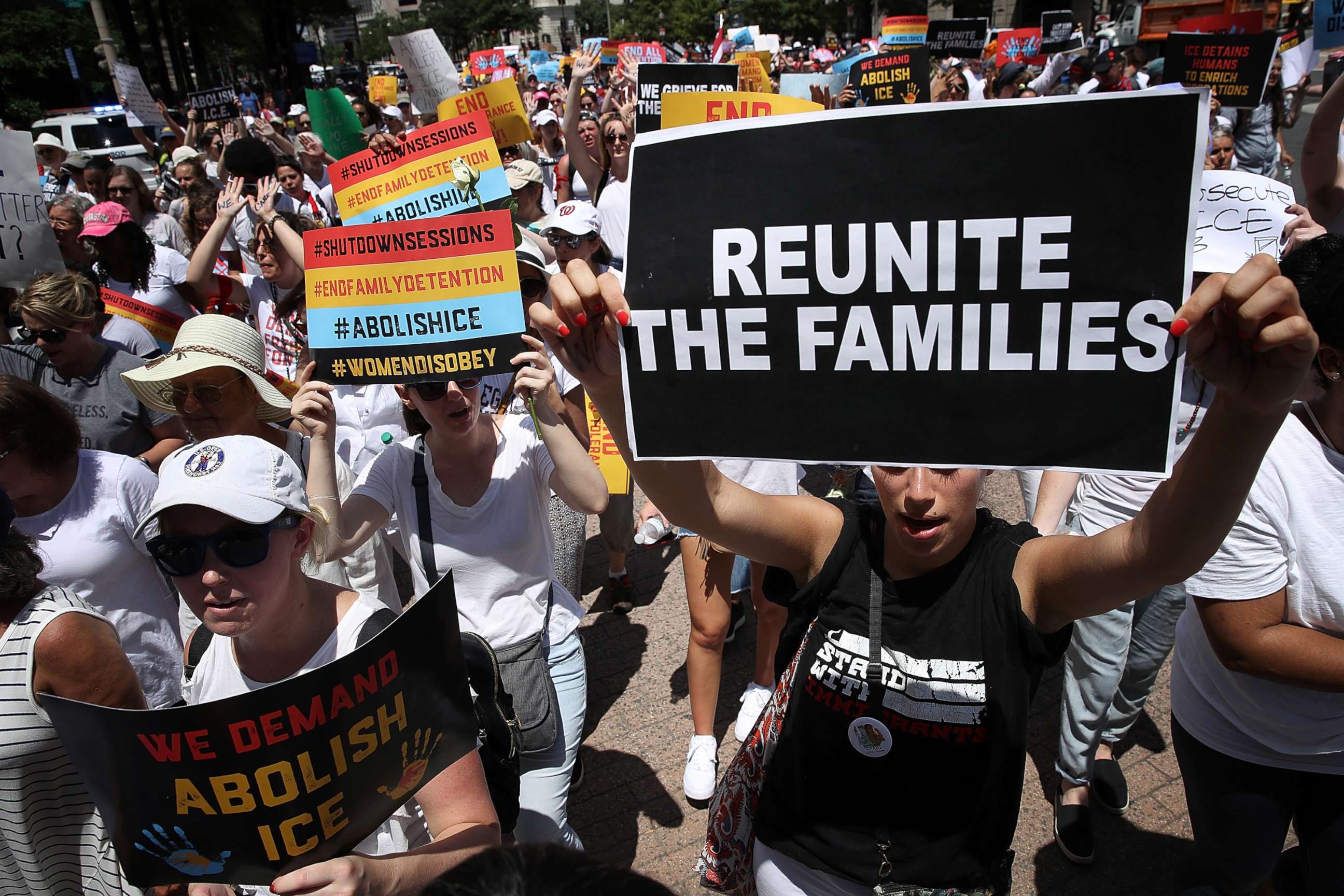 PHOTO: Protesters march from Freedom Plaza to demonstrate against family detentions and to demand the end of criminalizing efforts of asylum seekers and immigrants June 28, 2018 in Washington, D.C.