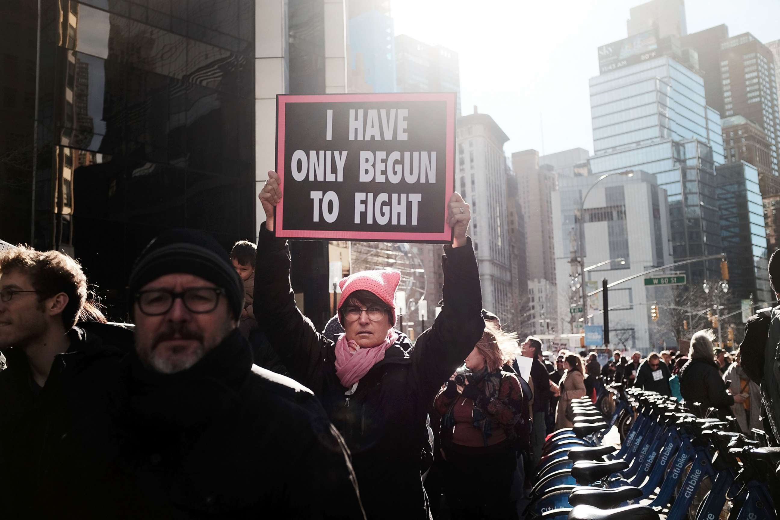 PHOTO: Thousands of men and women hold signs and rally while attending the Women's March, Jan. 20, 2018 in New York.
