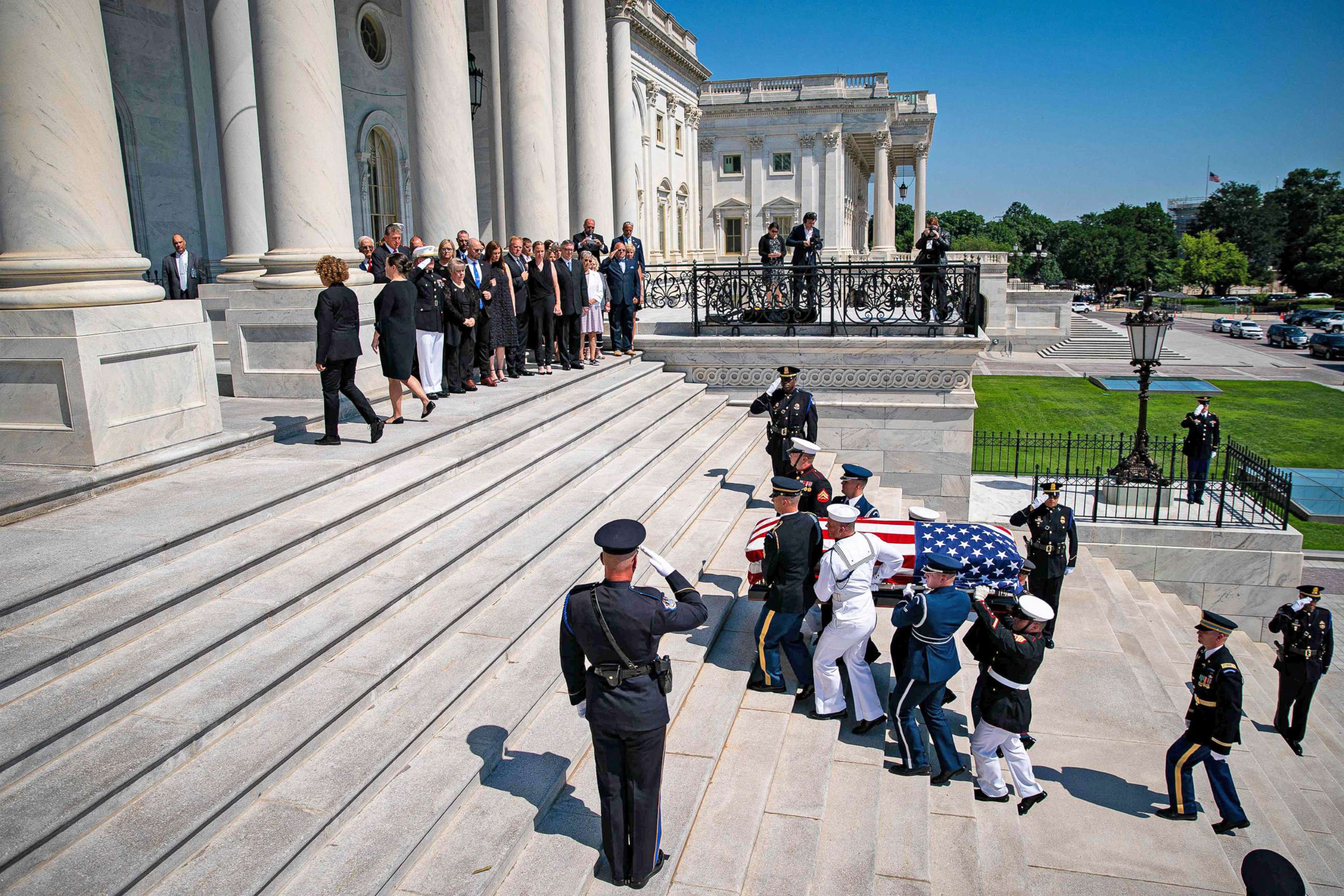 PHOTO: The flag-draped casket bearing the remains of Hershel W. Williams is carried by joint service members into the U.S. Capitol, to lie honor, on July 14, 2022 in Washington, D.C.