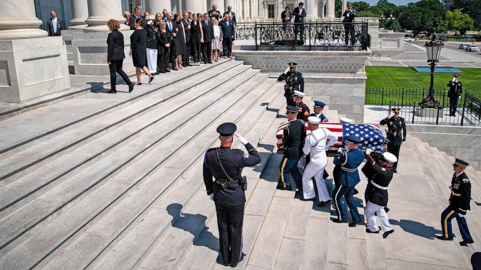 PHOTO: The flag-draped casket bearing the remains of Hershel W. Williams is carried by joint service members into the U.S. Capitol, to lie honor, on July 14, 2022 in Washington, D.C.